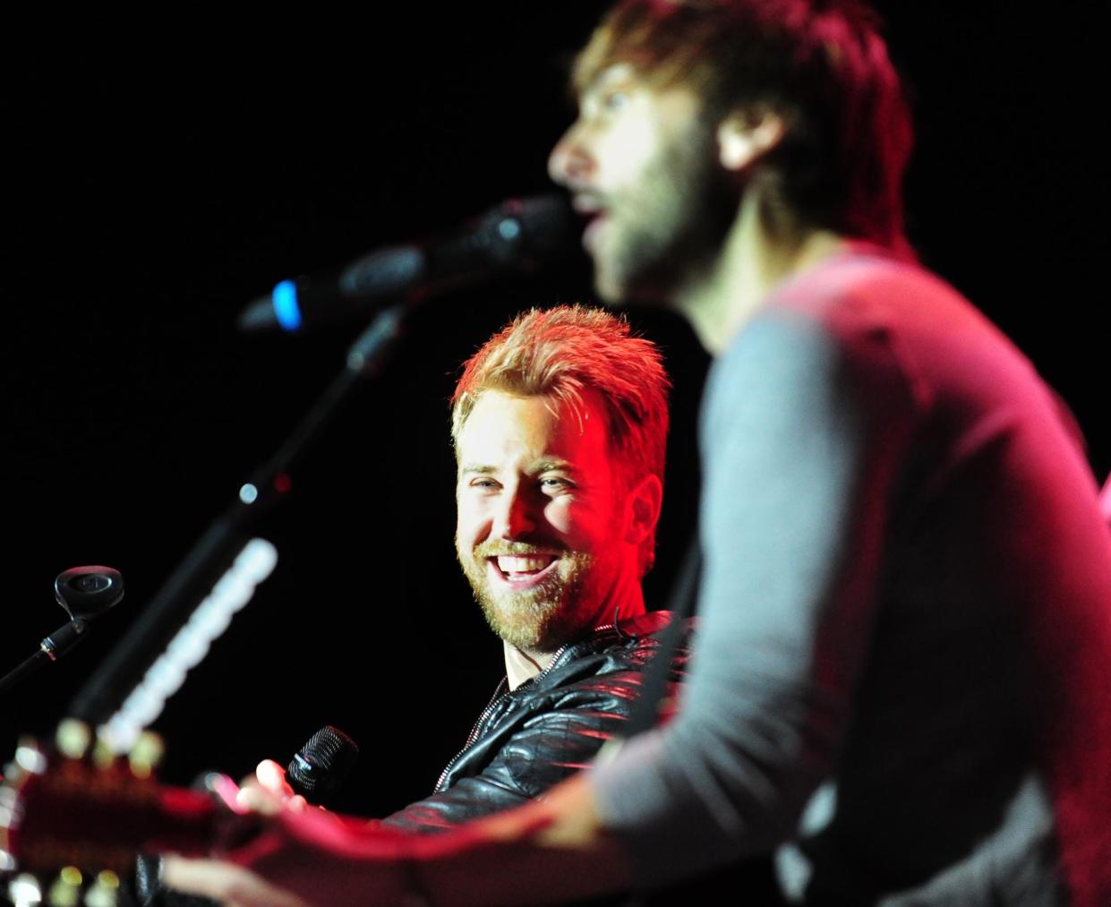 Lady A's Charles Kelley (left) and Dave Haywood, seen performing in 2020 at performed at the new amphitheater at Evans Town Center Park, are both graduates of Lakeside High School.