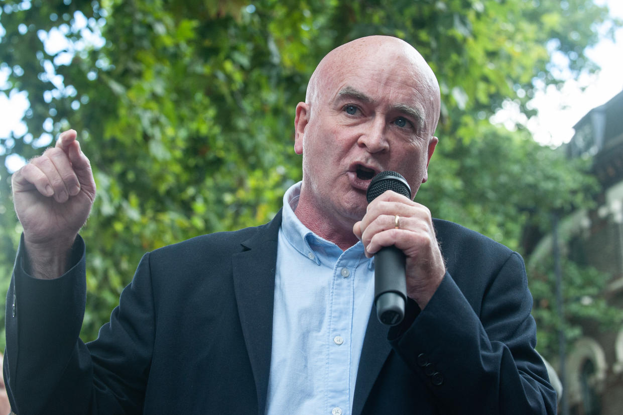 LONDON, ENGLAND - AUGUST 26: Mick Lynch of the RMT addresses a rally of striking postal workers on August 26, 2022 in London, United Kingdom. More than 100,000 postal workers walk out across the country today in a dispute over pay. Members of the Communication Workers Union (CWU) voted in favour of strike action by 97.6 per cent in the ballot, in the biggest strike of the summer so far. (Photo by Guy Smallman/Getty Images)