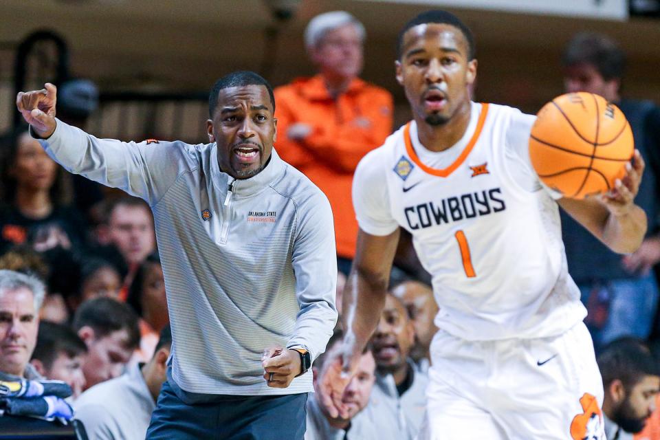 Oklahoma State head coach Mike Boynton Jr. yells to players in the first half during a college basketball game in the quarterfinals of the National Invitational Tournament between the Oklahoma State Cowboys (OSU) and the North Texas Mean Green at Gallagher-Iba Arena in Stillwater, Okla., Tuesday, March 21, 2023.