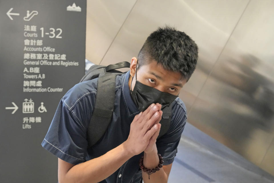 Owen Chow, one of the 47 pro-democracy defendants arrives a court in Hong Kong, Thursday, July 8, 2021. A court hearing for 47 pro-democracy activists charged with conspiracy to commit subversion under the security law over their involvement in an unofficial primary election last year that authorities said was a plot to paralyze Hong Kong's government. (AP Photo/Kin Cheung)