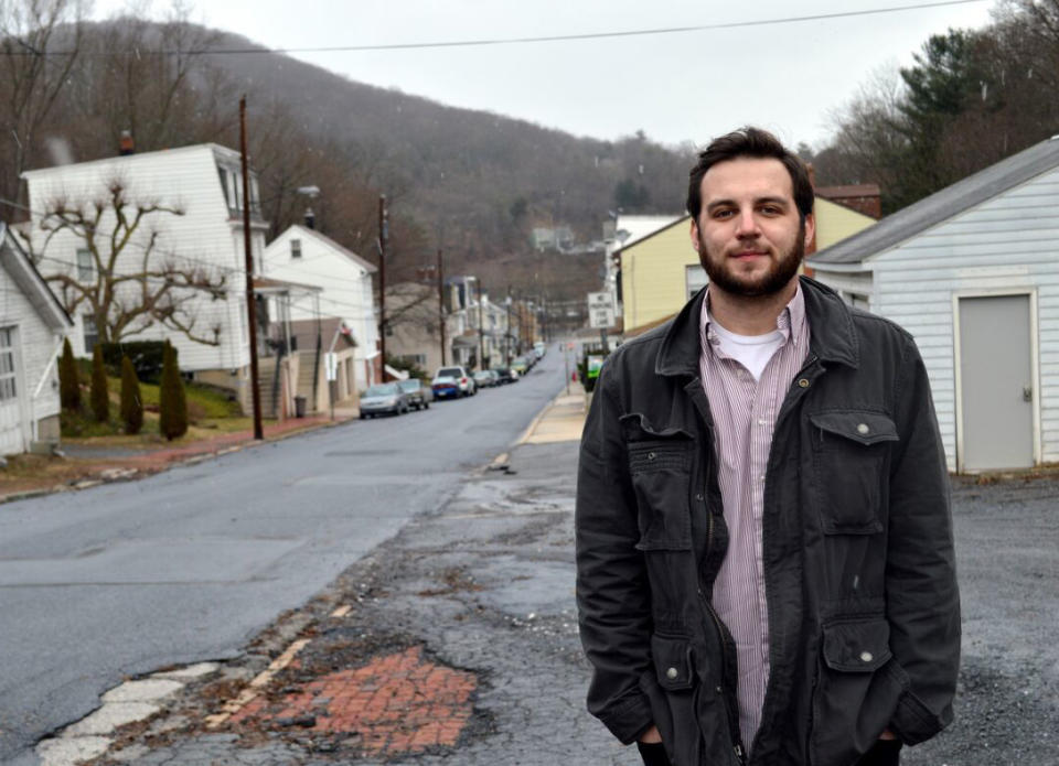 In this February 2016 photo provided by Michael Bunner, Brandon Wentz poses for a portrait in Mount Carbon, Pa., after he was appointed the town's mayor at age 22. Wentz's family is speaking out for the first time about his sudden death one year ago. Wentz was 22 when he became mayor of Mount Carbon, population 87. He died suddenly last November at age 24, just hours after resigning from office due to a family move. Wentz's family says he died of an overdose of heroin and fentanyl. His passing came near the end of a year that saw a record number of drug overdose deaths. (Michael Bunner via AP)