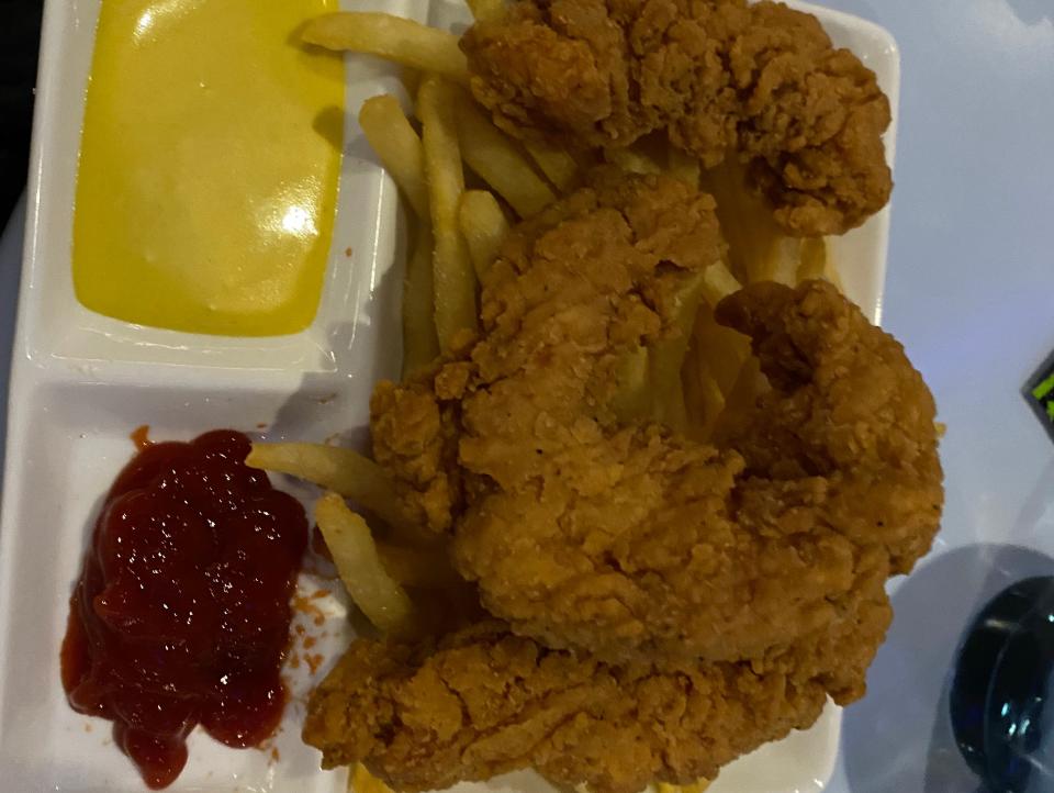 chicken tender kids' meal from space 220 with ketchup and mustard