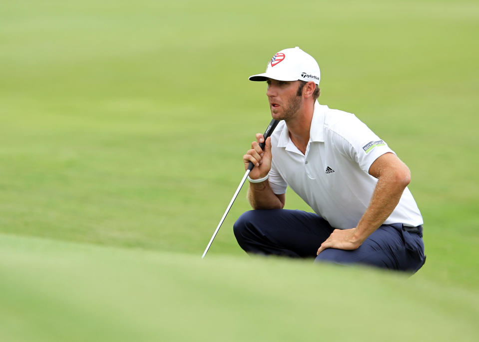 MEMPHIS, TN - JUNE 10: Dustin Johnson lines up his birdie putt on the 18th hole during the final round the FedEx St. Jude Classic at TPC Southwind on June 10, 2012 in Memphis, Tennessee. He won the tournament at 9 under par. (Photo by Andy Lyons/Getty Images)