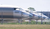 A row of unfinished Bombardier Global Express aircraft is seen at a Bombardier plant in Montreal on Friday, June 5, 2020. Bombardier Aviation is reducing its workforce by about 2,500 employees due to challenges caused by COVID-19. The company said Friday that it had to make the move because business jet deliveries, industry-wide, are forecast to be down approximately 30% year-over-year due to the pandemic. (Paul Chiasson/The Canadian Press via AP)