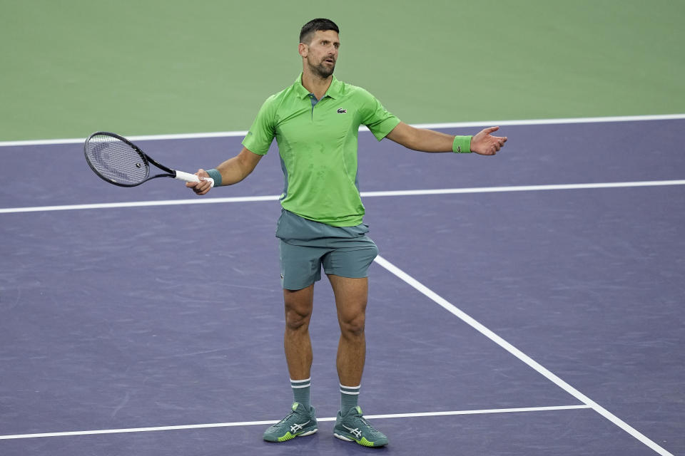 Novak Djokovic, of Serbia, reacts after losing a point against Luca Nardi, of Italy, at the BNP Paribas Open tennis tournament, Monday, March 11, 2024, in Indian Wells, Calif. (AP Photo/Mark J. Terrill)