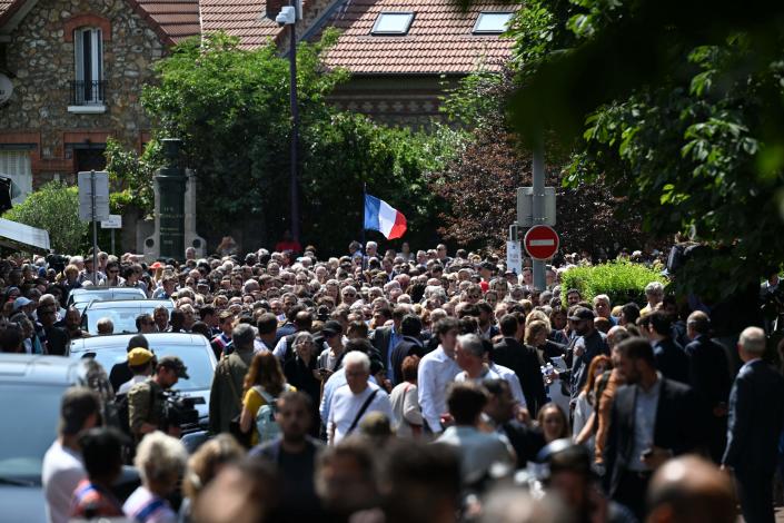 Participants attend a nationwide action in front of town halls, after rioters rammed a vehicle into the Mayor’s house injuring his wife and one of his children overnight, in L’Hay-les-Roses, south of Paris, on 3 July 2023 (AFP via Getty Images)