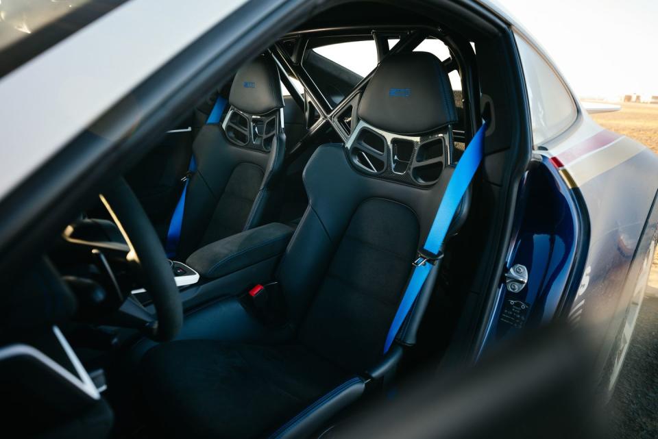 <p>The standard one-piece carbon buckets feel like a boxing opponent off-road, so we suggest the standard 18-way power-adjustable heated performance seats, a no-cost option. Meanwhile, you can't get the roll bar in the U.S. at any price.</p>