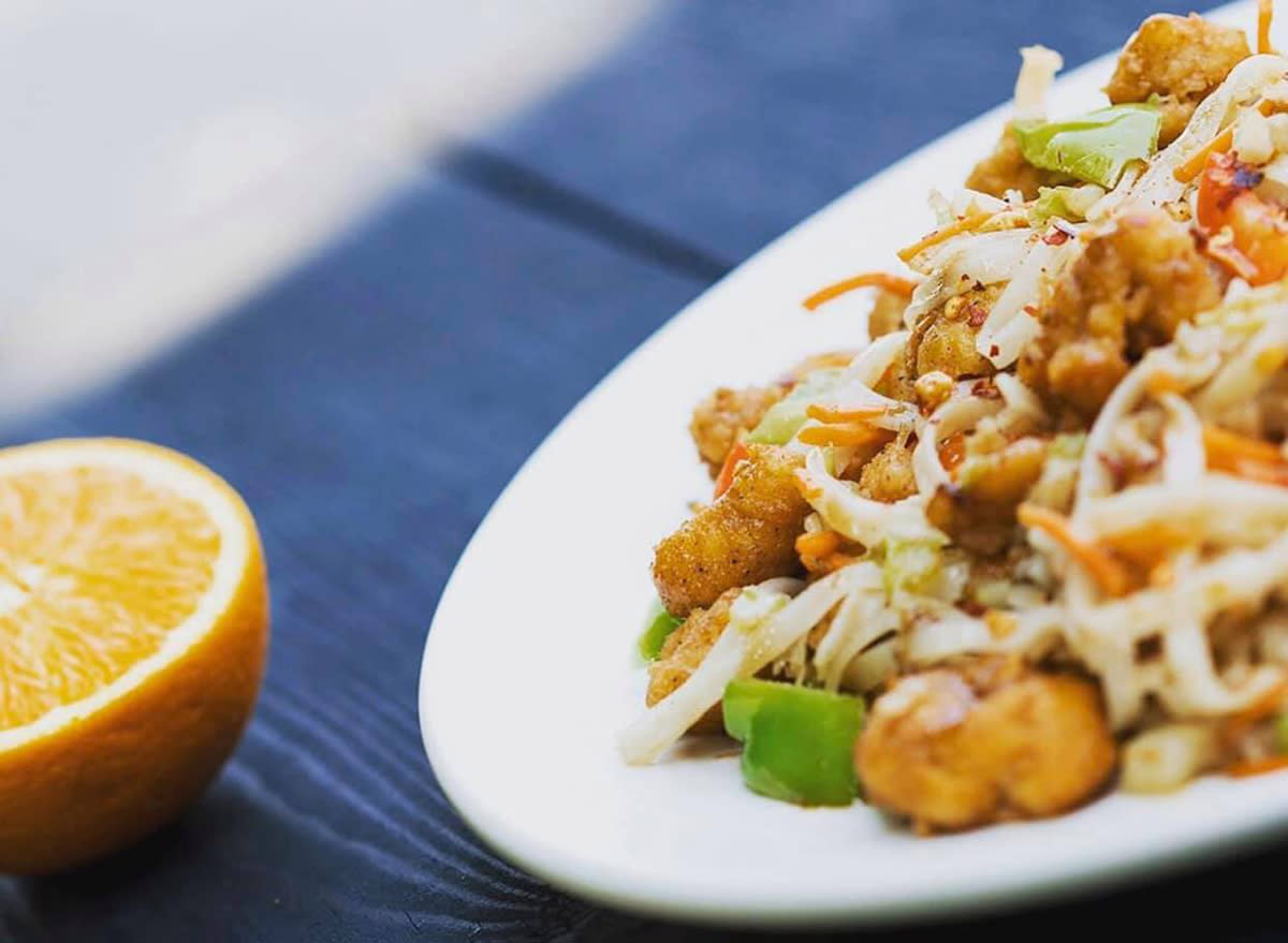 huhot orange chicken on a white plate.