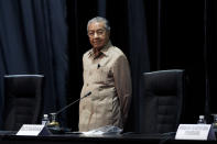 Malaysia's interim leader Mahathir Mohamad attends the committee on the exercise of the inalienable rights of the Palestinian people, in Kuala Lumpur, Malaysia, Friday, Feb. 28, 2020. The speaker of Malaysia's House rejected Mahathir Mohamad's call for a vote next week to chose a new premier, deepening the country's political turmoil after the ruling alliance collapsed this week. (AP Photo/Vincent Thian)