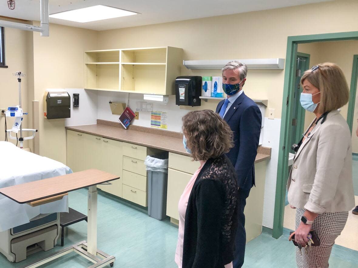 Premier Tim Houston tours the new urgent care centre that will open Nov. 1 in the Northside General Hospital with doctors Joan Salah and Stephanie Langley.   (Tom Ayers/CBC - image credit)