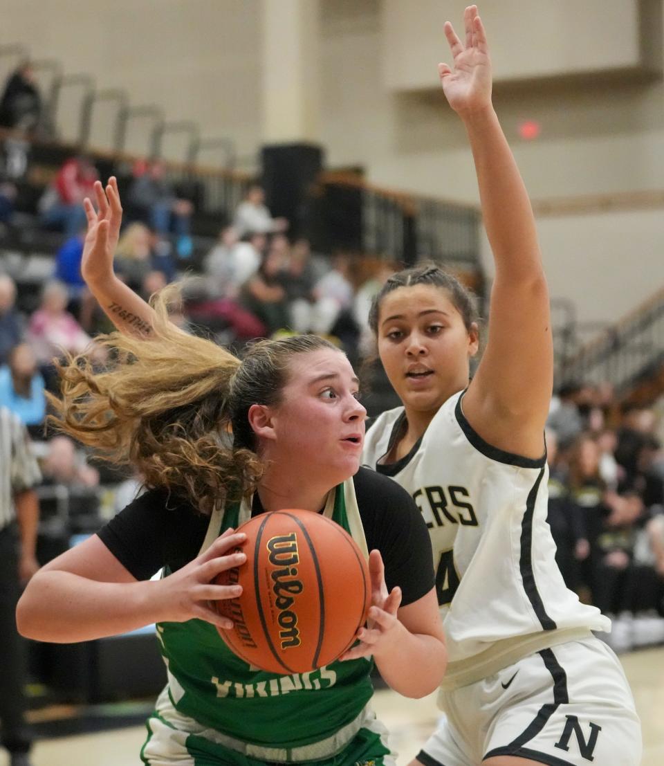 Valparaiso High School's Lillian Barnes (23) is defended by Noblesville High School's Bri Gray (34) at Noblesville High School, Dec 28, 2023. Noblesville won 65-56.