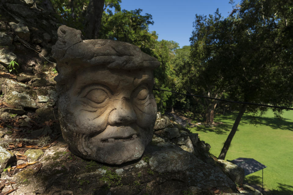 One of four heads of "Bacabs", gods also known as "Pauahtun," stands over Temple 11 in Copan, an ancient Maya site in western Honduras, Sunday, Sept. 24, 2023. Scientists are trying to understand how some ancient buildings have lasted for centuries in hopes of making modern buildings more durable. (AP Photo/Moises Castillo)