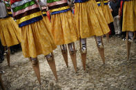 <p>Dancers perform on stilts in honor of Saint Mary Magdalene in a street for the traditional “Danza de Los Zancos” (Los Zancos Dance), in the small town of Anguiano, northern Spain, July 23, 2016. (AP Photo/Alvaro Barrientos)</p>