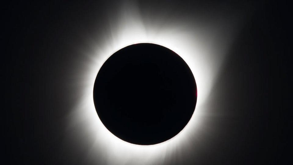 <div>The total solar eclipse on Aug. 21, 2017, was photographed from Madras, Oregon. The black circle in the middle is the Moon. Surrounding it are white streams of light belonging to the Sun’s outer atmosphere, called the corona. (NASA/Aubrey Gemignani)</div>