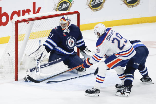 Morrissey has 2 goals, assist as Jets outlast Oilers 7-5