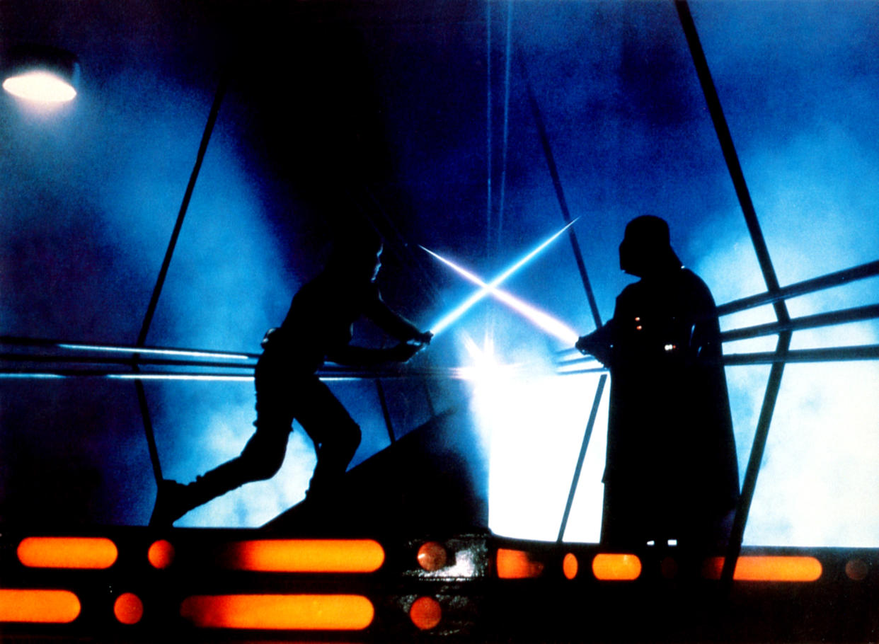 Luke (Mark Hamill) and Darth Vader (David Prowse) cross lightsabers in The Empire Strikes Back. (Photo: 20thCentFox/Courtesy Everett Collection)