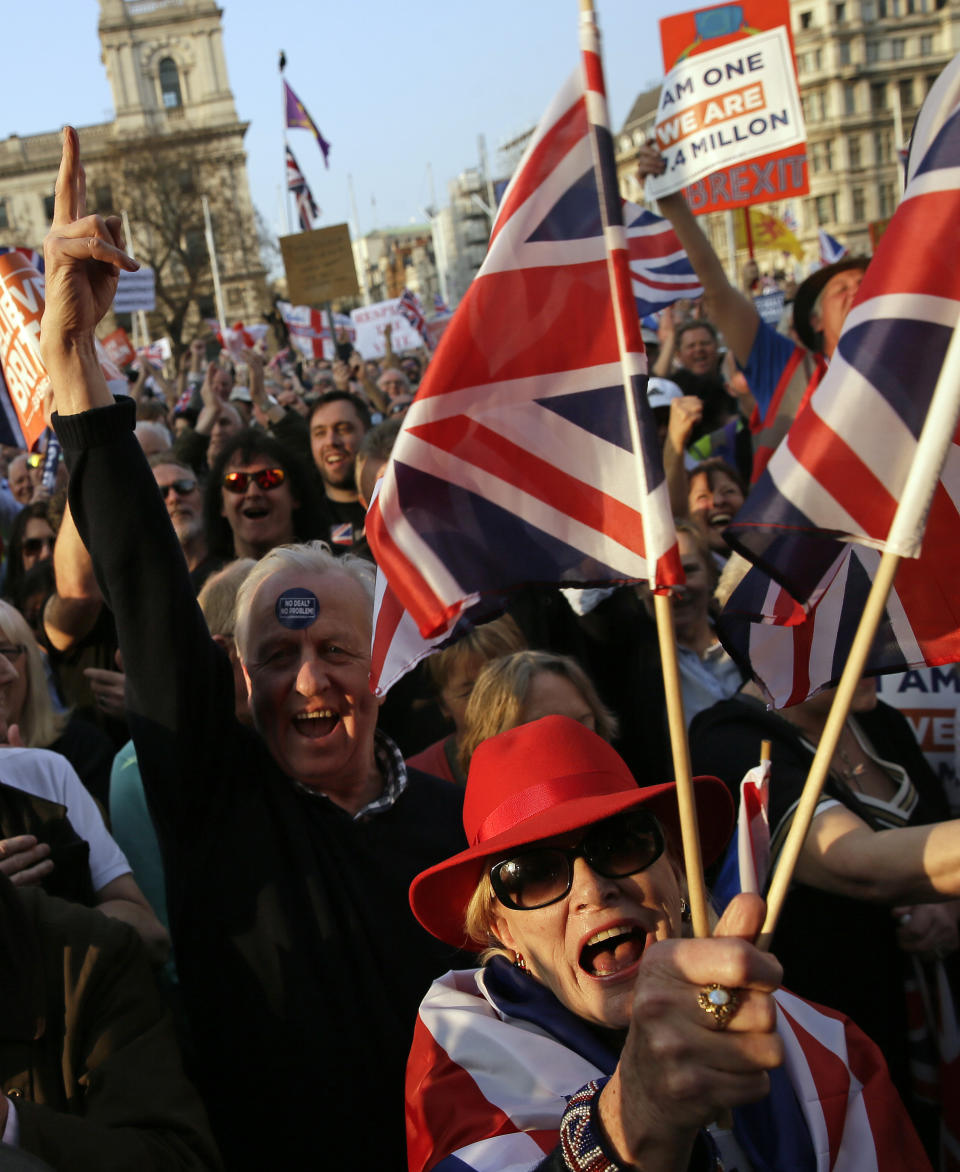 Pro-Brexit leave the European Union supporters attend a rally in Parliament Square after the final leg of the "March to Leave" in London, Friday, March 29, 2019. The protest march which started on March 16 in Sunderland, north east England, finishes on Friday March 29 in Parliament Square, London, on what was the original date for Brexit to happen before the recent extension. (AP Photo/Tim Ireland)