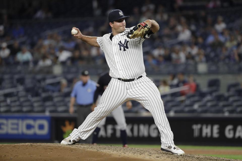 New York Yankees' Mike Ford delivers a pitch during the eighth inning of the team's baseball game against the Cleveland Indians on Thursday, Aug. 15, 2019, in New York. (AP Photo/Frank Franklin II)