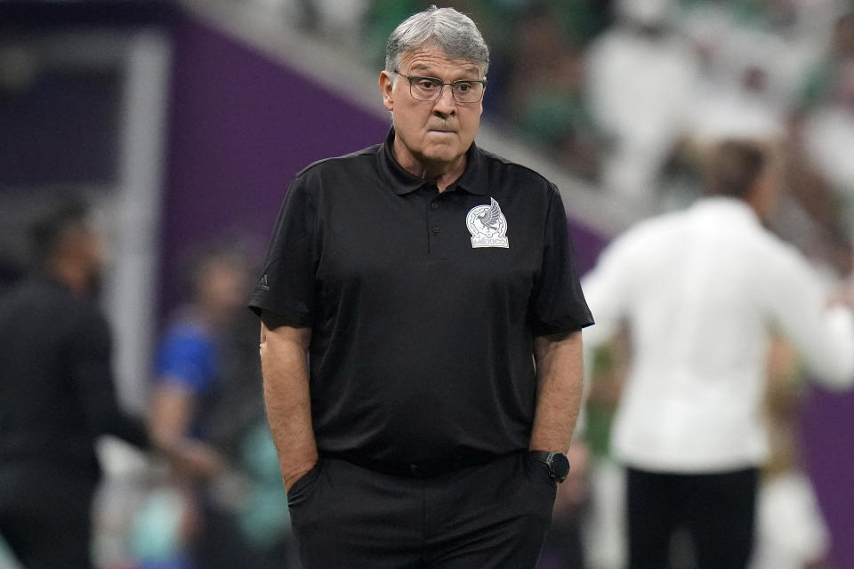 Mexico's head coach Gerardo Martino watches his team during the World Cup group C soccer match between Saudi Arabia and Mexico, at the Lusail Stadium in Lusail, Qatar, Wednesday, Nov. 30, 2022. (AP Photo/Moises Castillo)