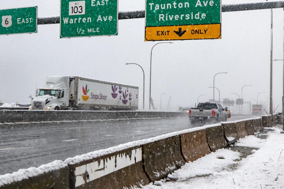 A tractor-trailer travels west across the Washington Bridge during a snowstorm last month.