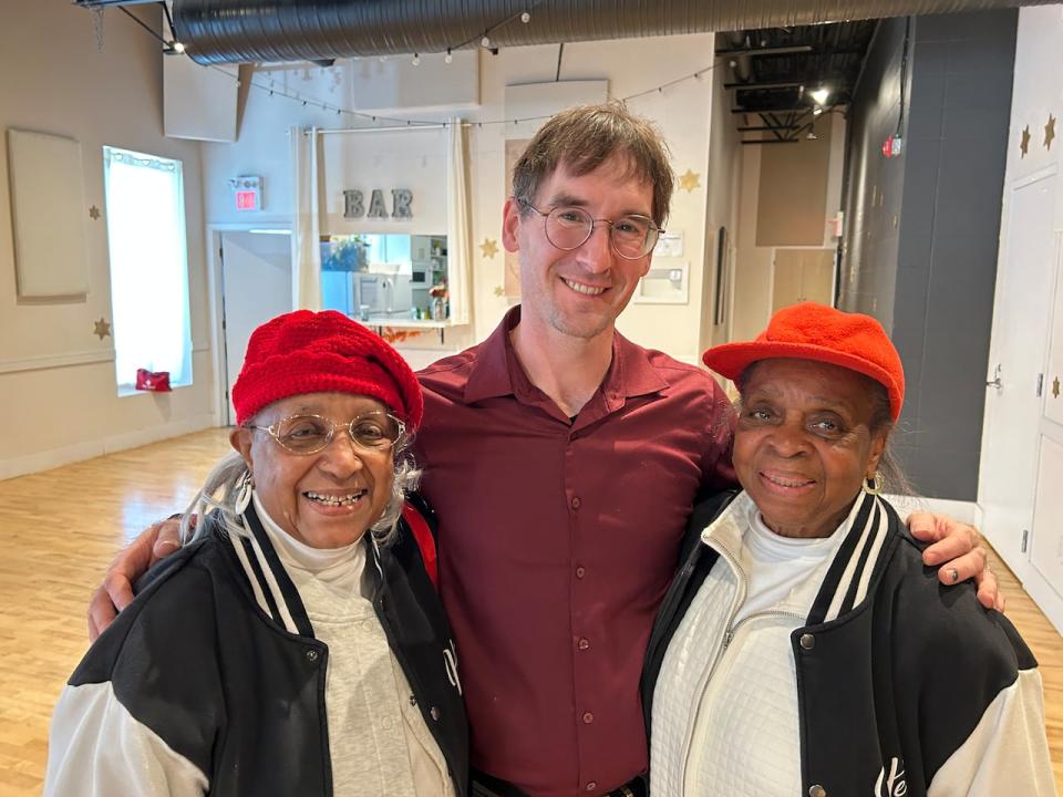 Birkley Wiesnewski, center, started Sugar Swing Ballroom in 2005. Almost 20 years later he's created a vibrant Lindy Hop community in Edmonton, and celebrates the dance created by Black dancers like Sugar Sullivan, left, and Barbara Billups, right. 