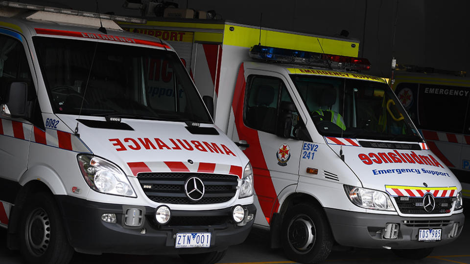 Pictured are two ambulances in a garage. Source: AAP