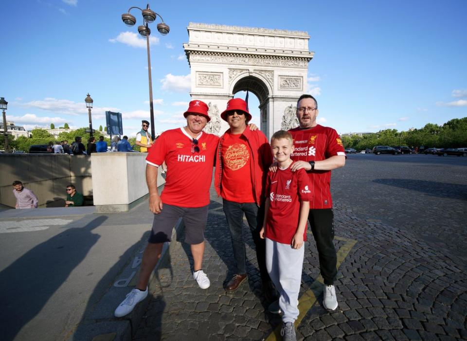 Fans pose in front of Paris landmarks (Peter Byrne/PA) (PA Wire)