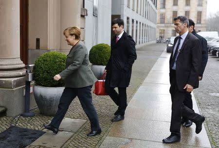 German Chancellor Angela Merkel arrives for exploratory talks at the German Parliamentary Society about forming a new coalition government in Berlin, Germany, November 16, 2017. REUTERS/Axel Schmidt