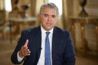 Colombia's President Ivan Duque speaks during an interview with Reuters in Bogota