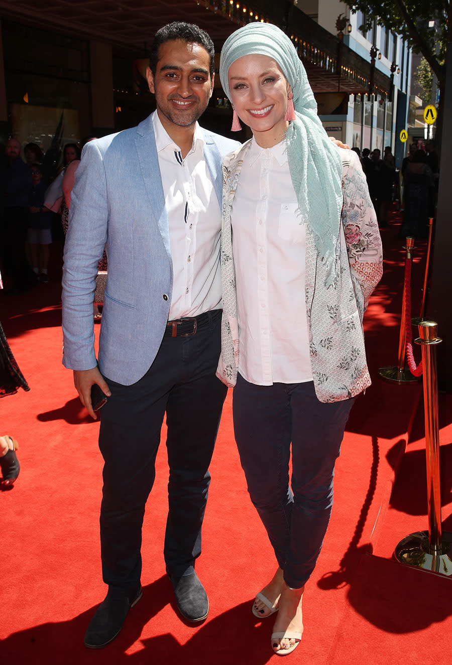 A photo of Waleed Aly and Dr Susan Carland on the red carpet.