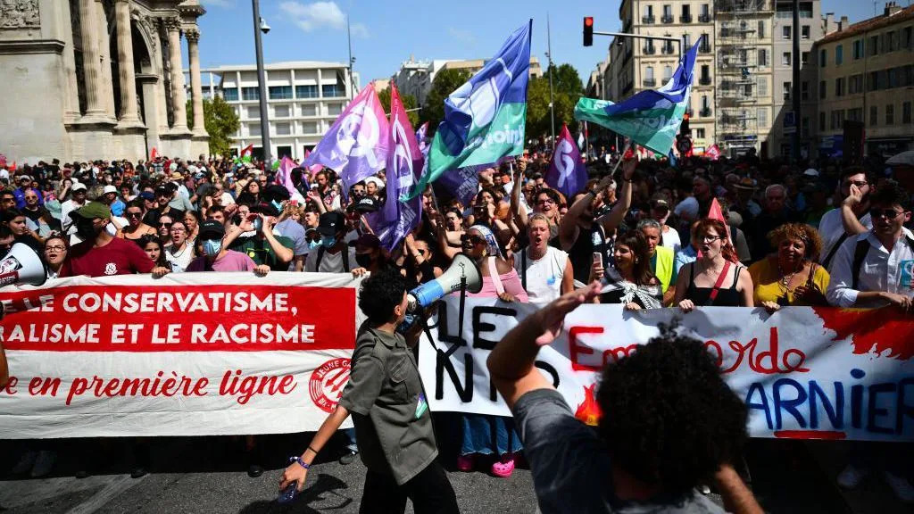 People take part in a demonstration against the appointment of right-wing Prime Minister Michel Barnier by France's President Emmanuel Macron in Marseille, southern France, on September 7, 2024.