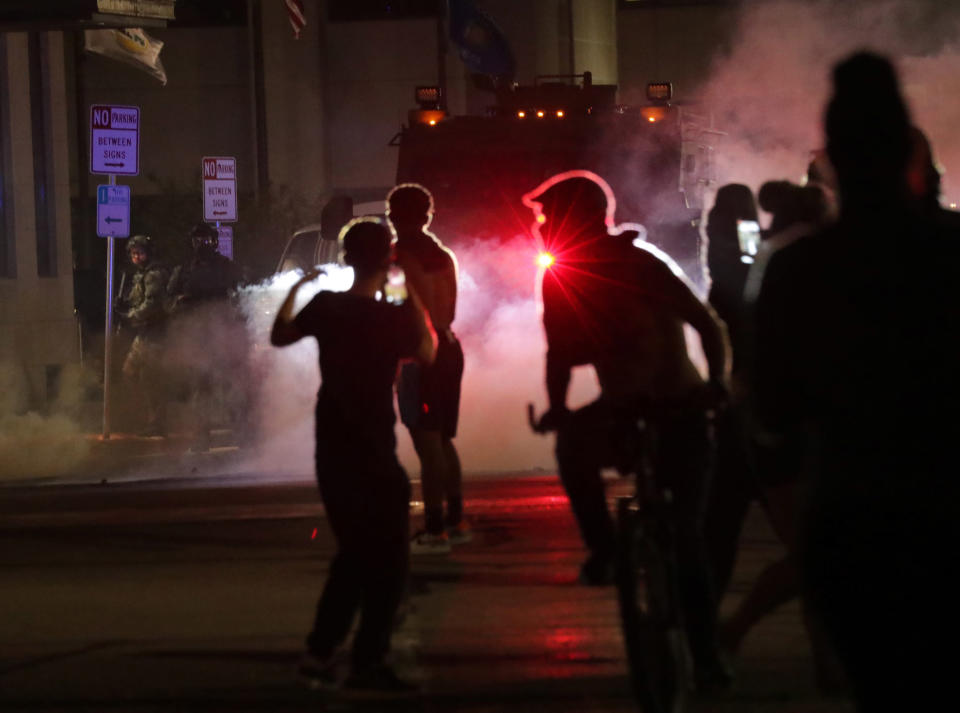 Aug 23, 2020; Kenosha, WI, USA; People gather outside the Kenosha County Courthouse in Kenosha on Sunday, Aug. 23, 2020. Kenosha police shot a man Sunday evening, setting off unrest in the city. Mandatory Credit: Mike De Sisti/Milwaukee Journal Sentinel via USA TODAY NETWORK/Sipa USA