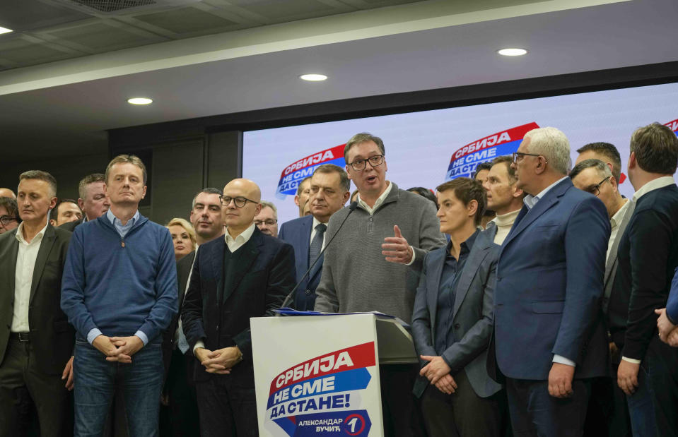 Serbian President Aleksandar Vucic speaks to the media in his party headquarters after a parliamentary and local election in Belgrade, Serbia, Sunday, Dec. 17, 2023. Serbia's governing populists claimed a sweeping victory Sunday in the country's parliamentary election, which was marred by reports of major irregularities both during a tense campaign and on voting day. (AP Photo/Darko Vojinovic)