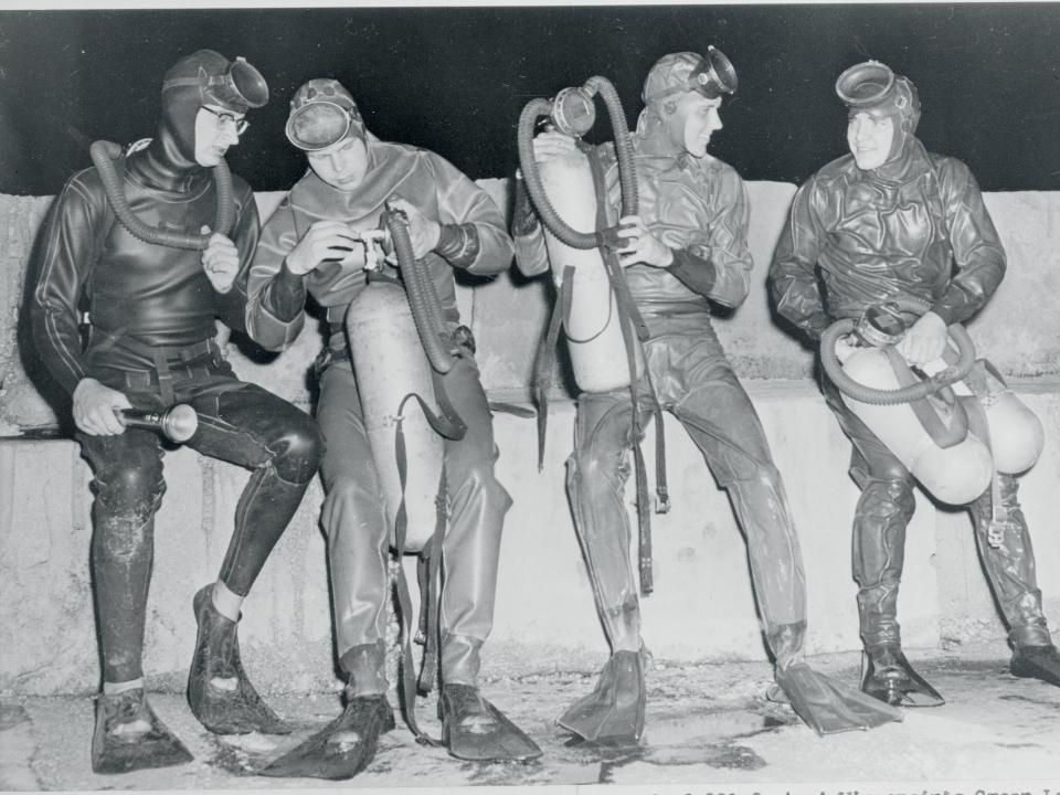 Four deep divers using aqua lungs in Wisconsin in 1954.