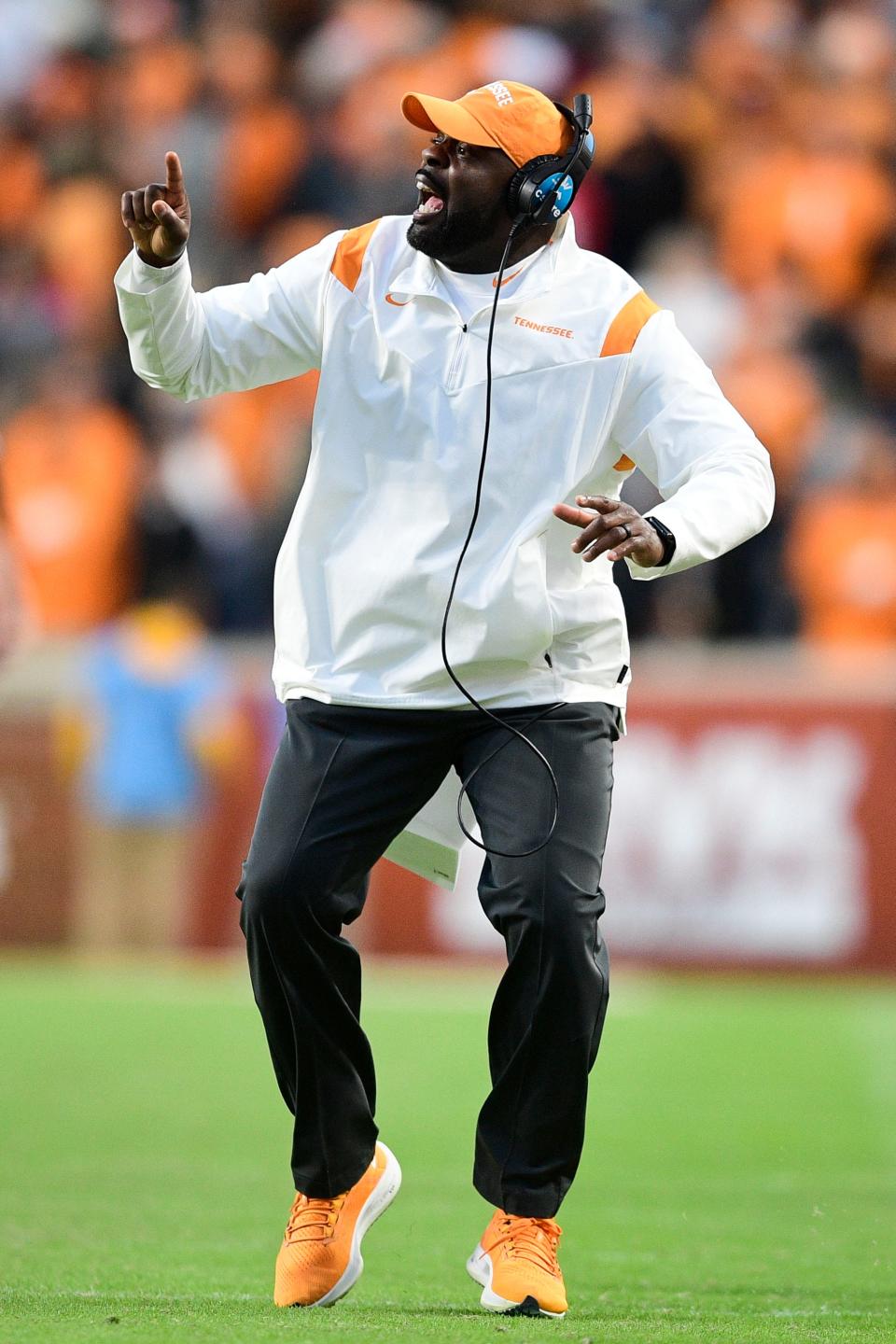 Tennessee linebackers coach Brian Jean-Mary calls from the sideline during an SEC football game between Tennessee and Georgia at Neyland Stadium in Knoxville, Tenn. on Saturday, Nov. 13, 2021.