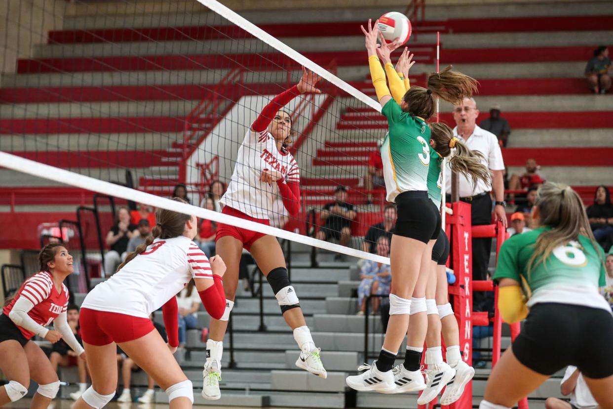 Ray's Jada James (12) spikes the ball during the match against Bishop on Tuesday, Aug. 16, 2022, at Ray High School in Corpus Christi, Texas.