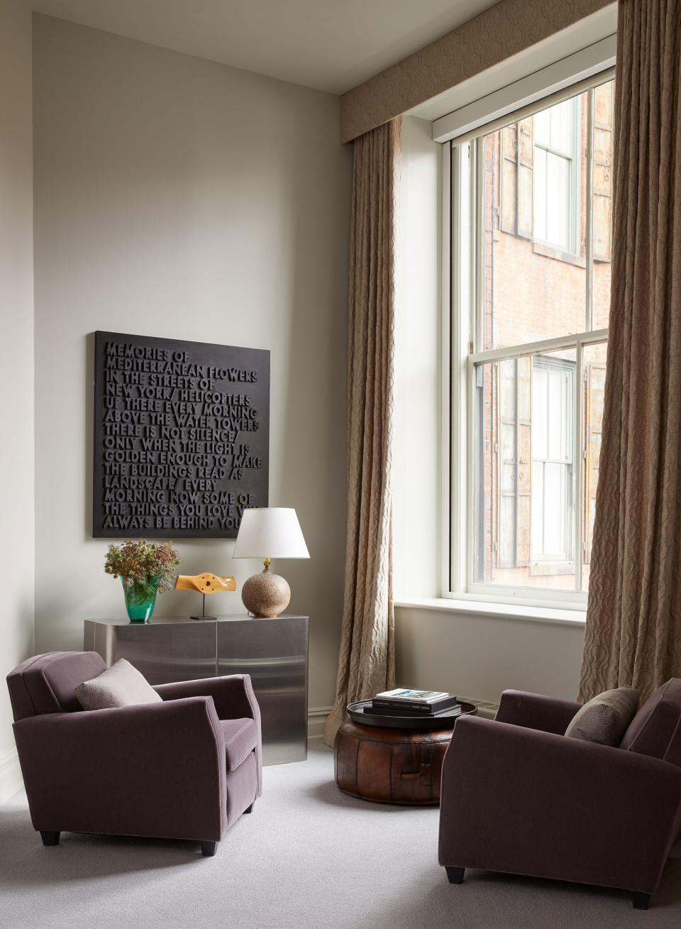 “There’s a pureness and sense of calm and gracefulness,” says Huniford of the space. In the study, he installed a Stark carpet and re-covered 19th-century club chairs with Donghia mohair velvet to create a cocoon-like feel. A vintage Moroccan ottoman and artwork by Robert Montgomery add subtle texture, ensuring that the room adheres to the designer’s conception of it as “an understatement.”