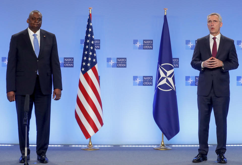 U.S. Secretary for Defense Lloyd J. Austin III, left, speaks during a joint press statement with NATO Secretary General Jens Stoltenberg prior to a meeting of NATO defense ministers at NATO headquarters in Brussels, Wednesday, Feb. 16, 2022. NATO defense ministers are meeting to discuss Russia's military buildup around Ukraine as it fuels one of Europe's biggest security crises in decades. (Stephanie Lecocq, Pool Photo via AP)