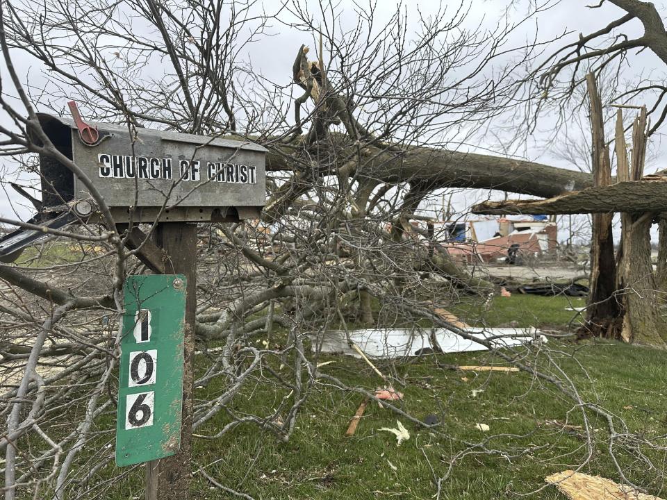 The remains of a destroyed church are seen in Winchester, Ind., on Friday, March 15, 2024, after it was destroyed in a storm that hit the area Thursday night. (AP Photo/Isabella Volmert)