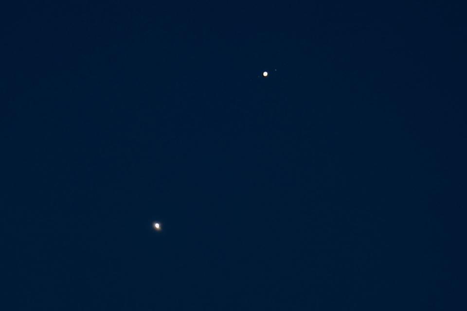 <p>Getty Images </p> Venus and Jupiter are seen as almost conjunction over Manhattan in 2022. 