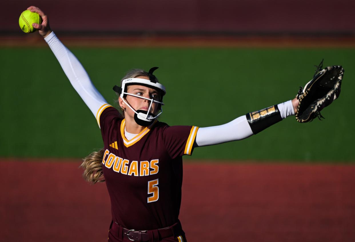 Bloomington North’s Kendyl Feutz (5) pitches during the softball game against Edgewood at Bloomington North on Tuesday, March 26, 2024.