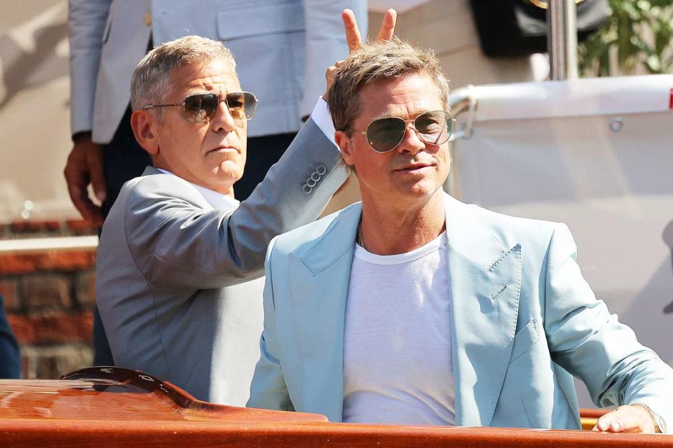 <p>Ernesto Ruscio/Getty</p> George Clooney and Brad Pitt 