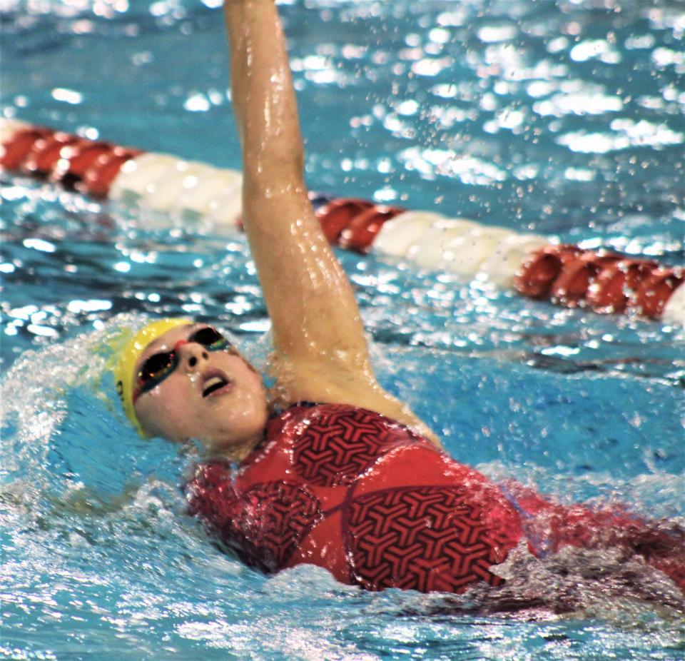 St. Ursula sophomore Addie Robillard swims to victory in the 200 individual medley during the OHSAA Southwest District Division I girls swimming championships Feb. 18, 2023 at Miami University