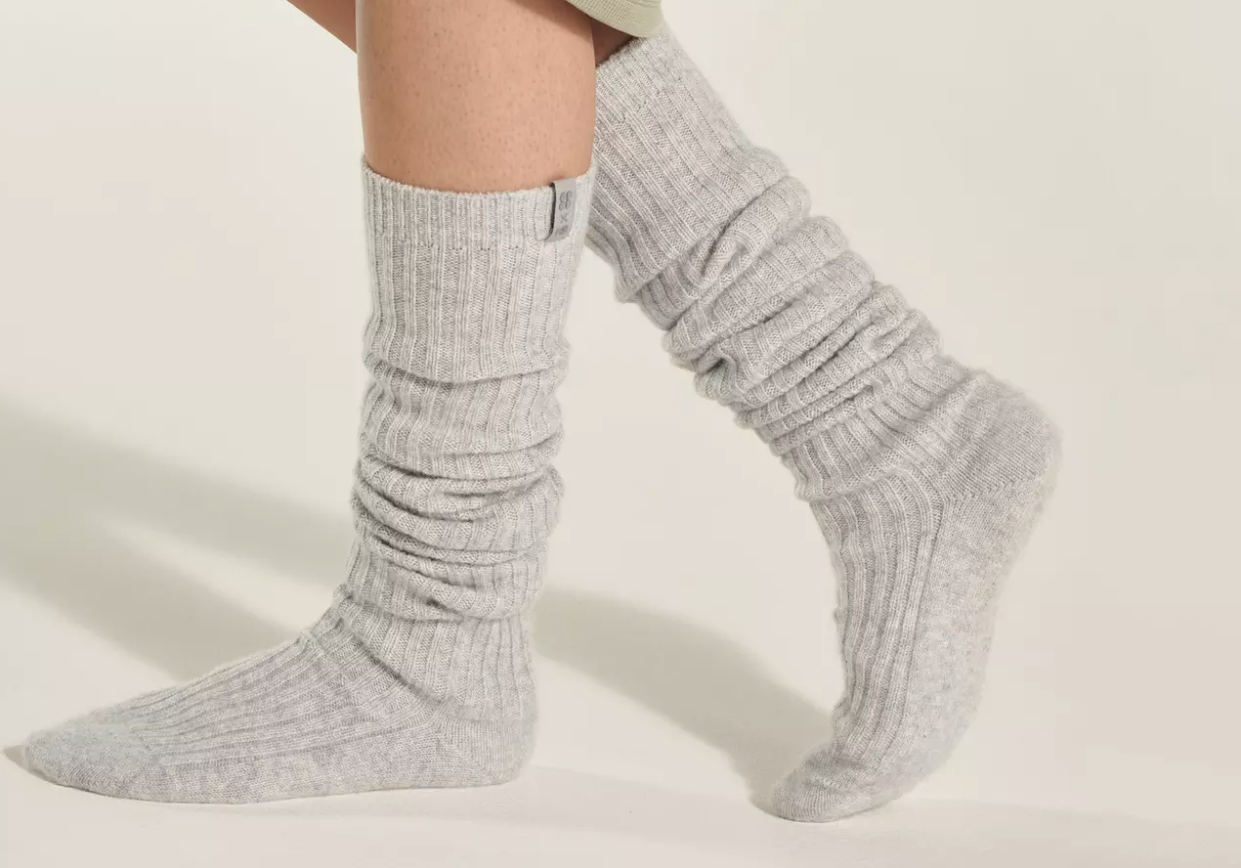 Feet in gray cashmere socks