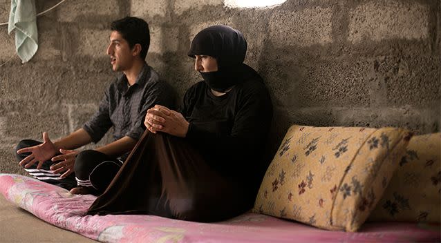 Nouri, right, and her son speak to the Associated Press at Kankhe Camp for the internally displaced in Dahuk, northern Iraq. Her husband, Murat Mahmoud, was killed on August 3, 2014, by Islamic State militants in a massacre of Yazidis. Photo: AP/Maya Alleruzzo
