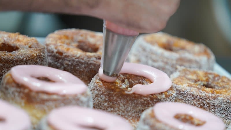 Dominique Ansel ices Cronuts before the opening of his namesake bakery in New York, Thursday, Sept. 28, 2023. The U.S. Census Bureau revealed that close to 5.5 million businesses were started in 2023.