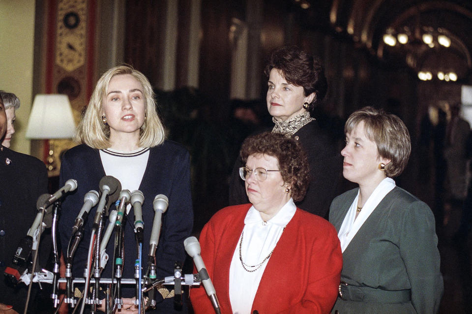 First lady Hillary Rodham Clinton, left, Sen. Barbara Mikulski, D-Md., Sen. Dianne Feinstein, D-Calif., and Sen. Patty Murray, D-Wash., meet reporters, accompanied by female members of the Senate, after a meeting on Capitol Hill on March 11, 1993 to discuss health care issues. (John Duricka / AP file)