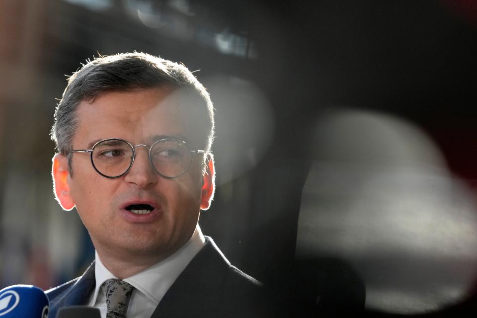 Ukraine's Foreign Minister Dmytro Kuleba speaks with the media as he arrives for a meeting of EU foreign ministers at the European Council building in Brussels last month (Copyright 2024 The Associated Press. All rights reserved)