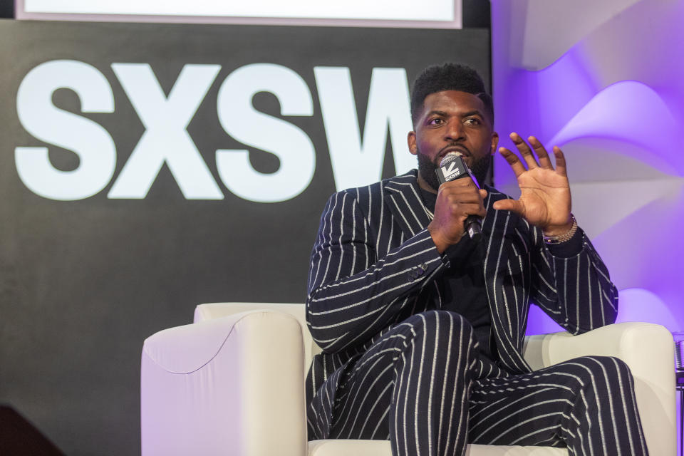 Emmanuel Acho Wearing Pinstripe Suit