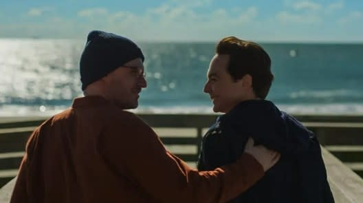 Kit (Ben Aldridge) and Michael (Jim Parons) in front of the ocean in a scene from "Spoiler Alert"